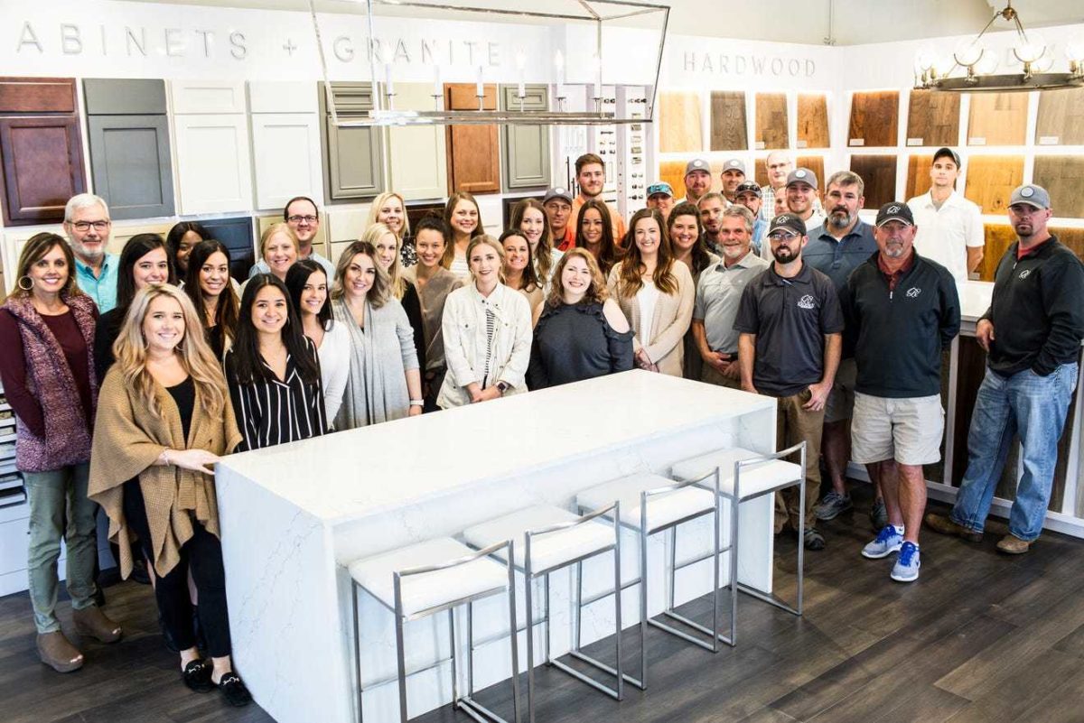 Staff members pose for a portrait at the Regency Homebuilders office. The company was voted the Top Workplace among small businesses. Brad Vest/The Commercial Appeal